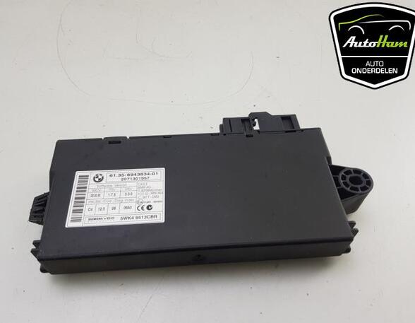 Control unit for door drawing support BMW 3 (E90), BMW 1 (E81), BMW 1 (E87), BMW 3 Touring (E91)