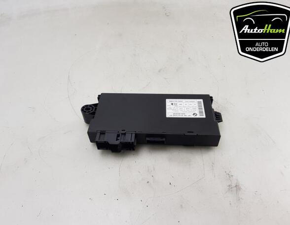 Control unit for door drawing support BMW 3 Coupe (E92), BMW 1 (E81), BMW 1 (E87), MINI MINI (R56)