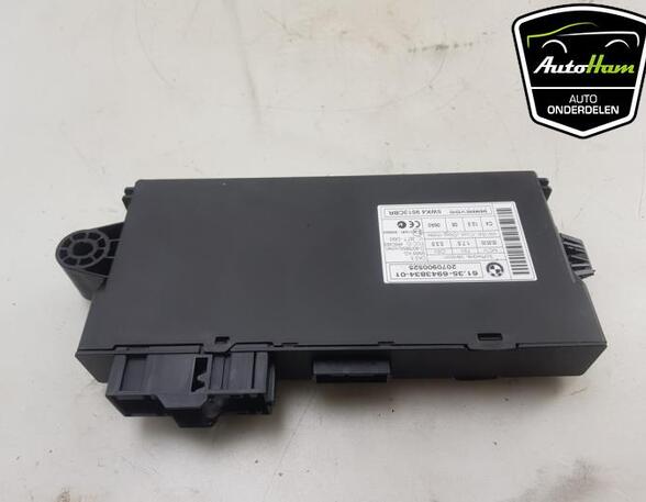 Control unit for door drawing support BMW 1 (E81), BMW 1 (E87), MINI MINI (R56), BMW 3 (E90)