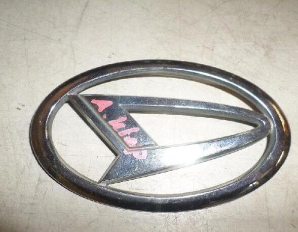 Front Grill Badge Emblem DAIHATSU CUORE VI (L251, L250_, L260_)