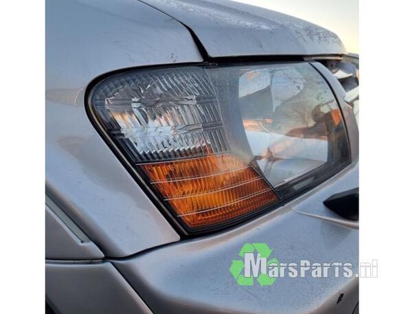 Headlight MITSUBISHI PAJERO IV (V8_W, V9_W)