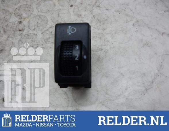 Switch for headlight range adjustment NISSAN NV200 Van